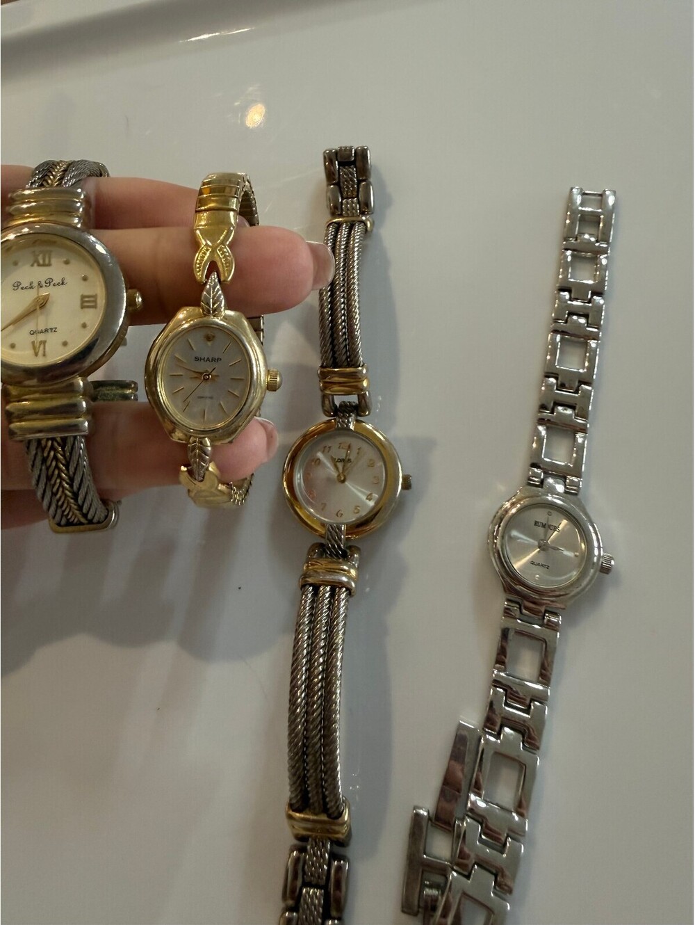 Set of 4 Women's Vintage Wristwatches - Peck & Peck, Sharp, Lorus, Rumours